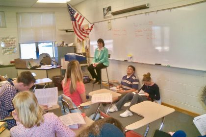Teacher and students using classroom technology
