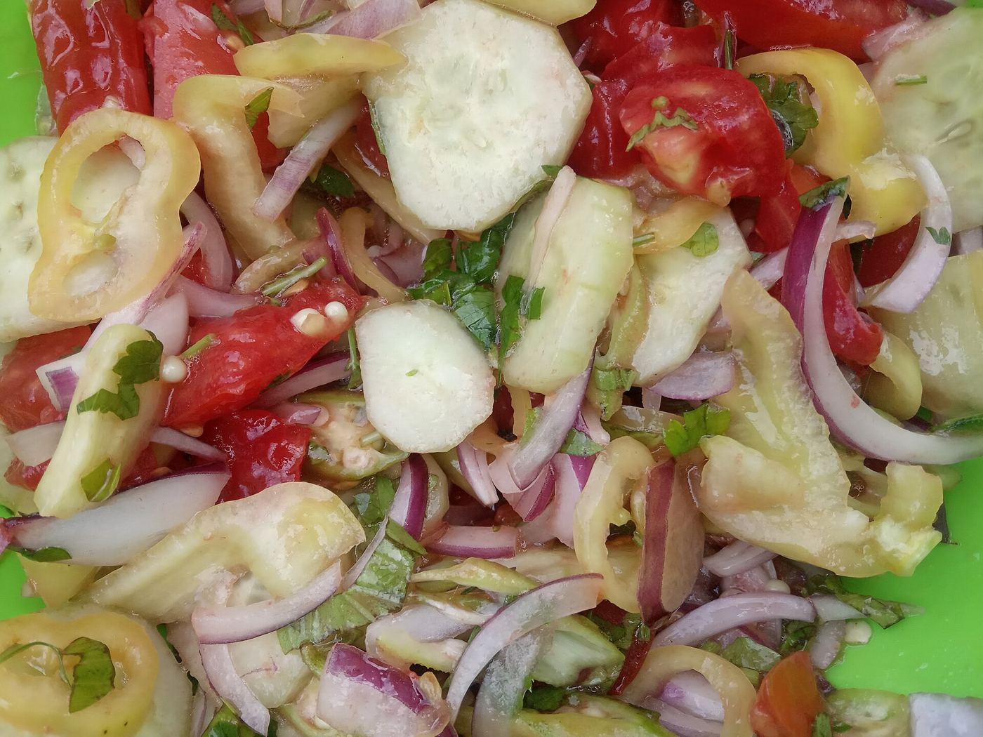 bowl of fresh vegetables with olive oil